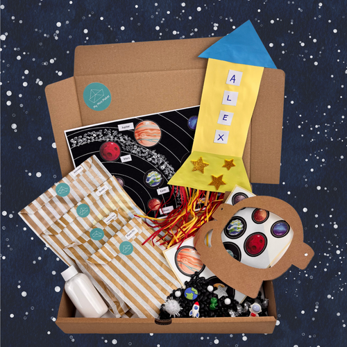 Space Activity Kit box with rocket craft, planet picture, astronaut mask and space sensory tray materials on a starry background