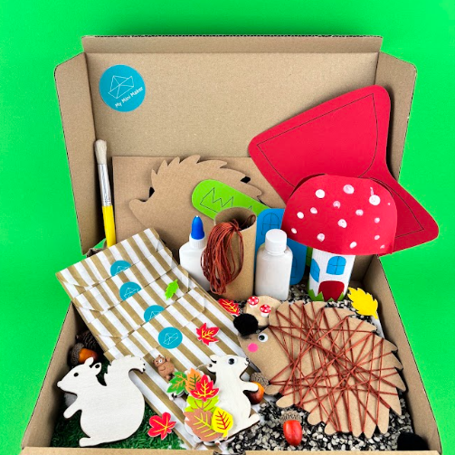 Monthly Activity Kit box for September's Forest theme: squirrel, mushroom and hedgehog crafts, sensory tray materials, glue and paint