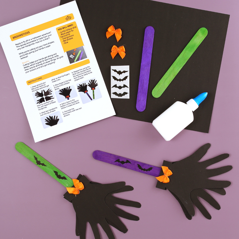 My Mini Maker Halloween craft kit with popsicle sticks, glue, and instructions on a purple background