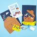 My Mini Maker craft kit treasure chest, gems, and instructions on a blue background