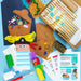 Craft kit with pirate-themed items on a blue background