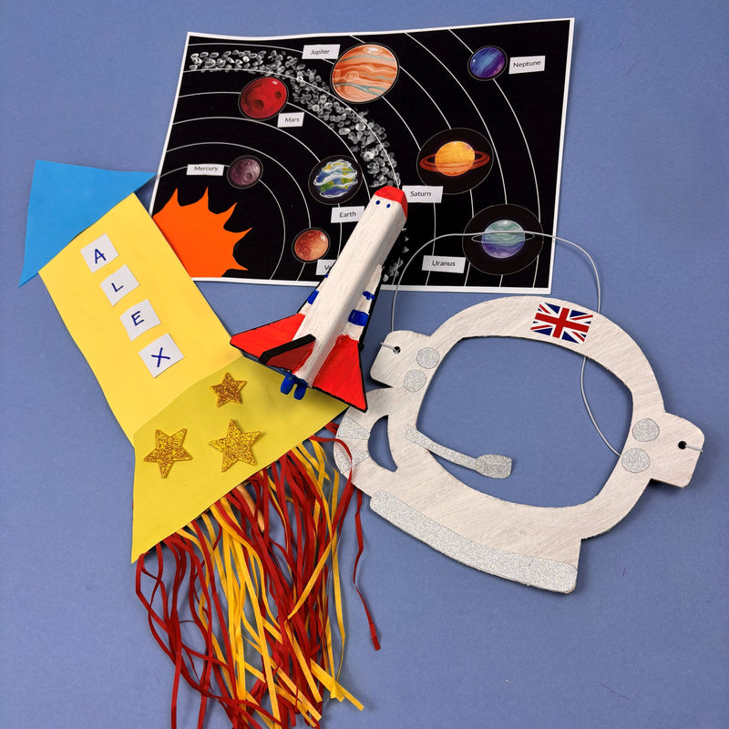 This image shows all 4 activities in the space project kit, the rocket, astronaut mask, solar system and space shuttle