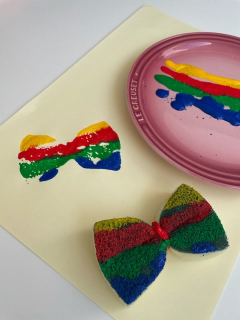 Painted butterfly prints made with a sponge stamp