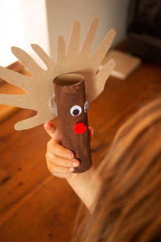 Brown toilet roll reindeer with a red pom-pom nose and handprint antlers