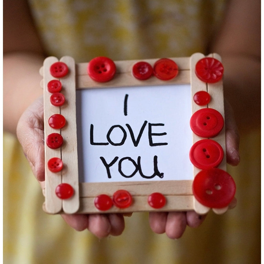 Valentine's Day crafts for kids: a decorated picture frame with a photo